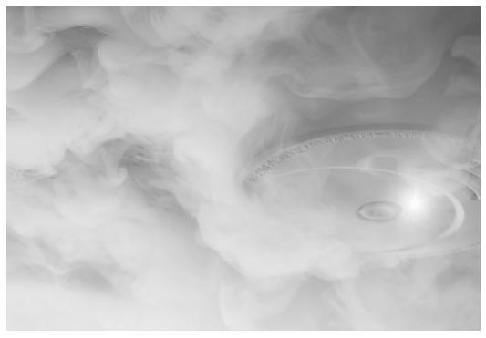 smoke detector with smoke surrounding it