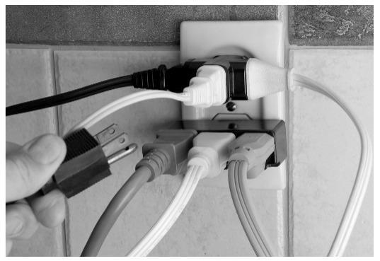 overloaded wall power outlet